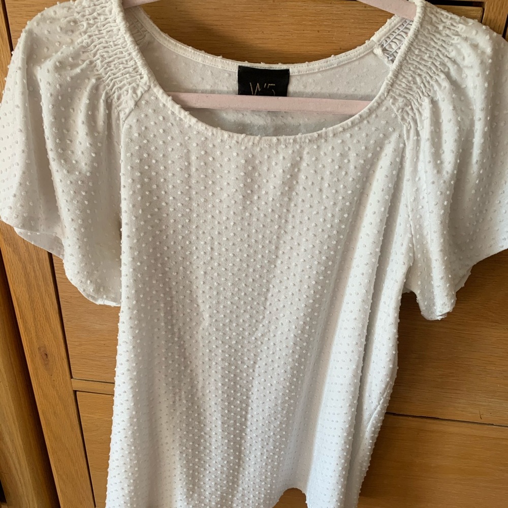 White blouse with flowy sleeves